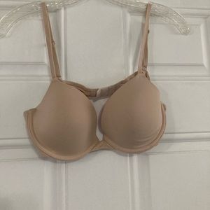 Pink Victoria Secret Bra, 36B, Tan colored, Pink interior.